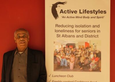 Some one standing by a poster for Active Lifestyles